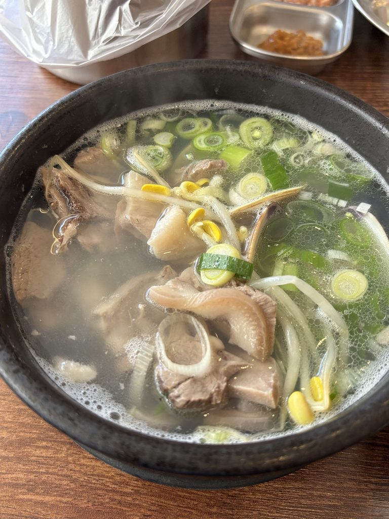 Clams, pork and bean sprouts in Yeosu-style gukbap