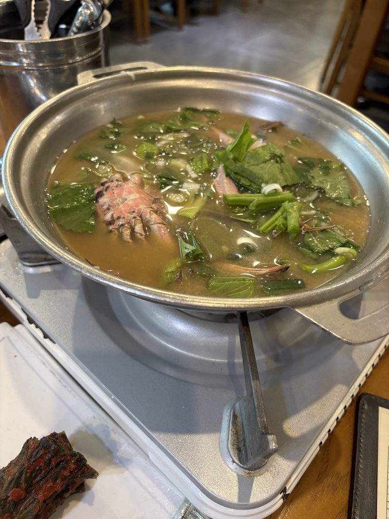 Hot Korean crab soup served with gejang